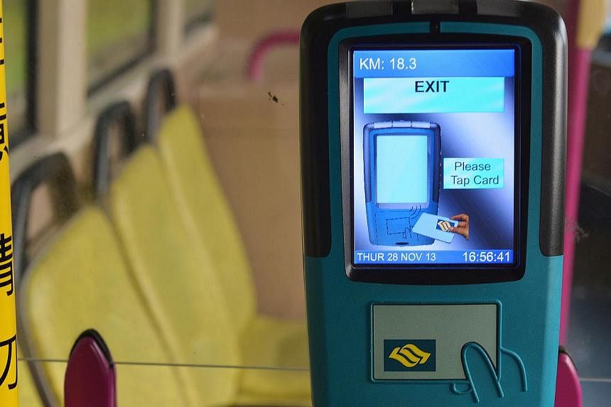 By assembling a data analytics team to make sense of the data contained on commuters' bus fare cards, the LTA collected useful information to add new bus routes and relieve crowding. -- PHOTO: ST FILE