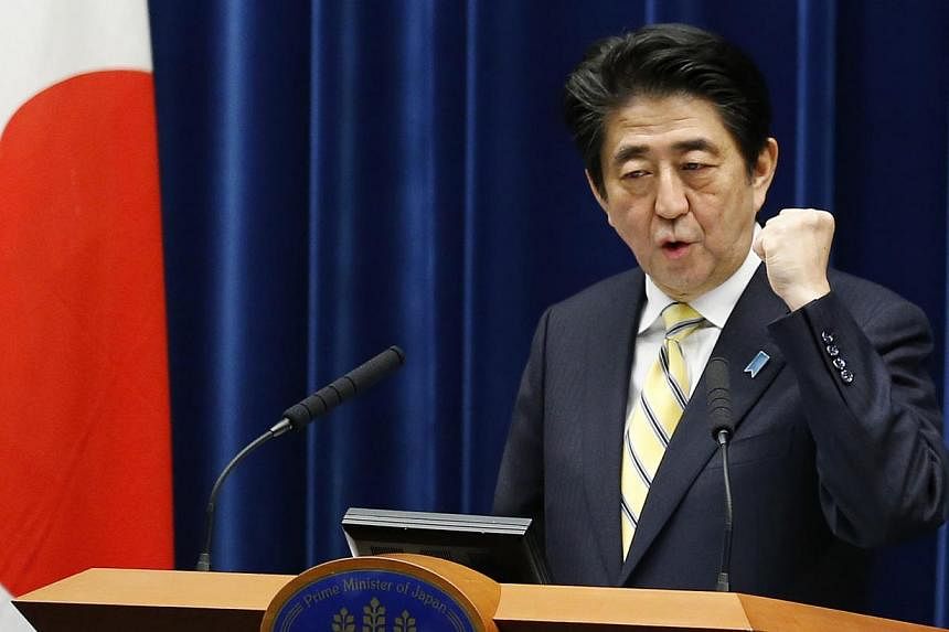 Japanese voters, puzzled as to why Prime Minister Shinzo Abe is calling an election now and unimpressed by opposition alternatives, may shun a Dec 14 election in record numbers. -- PHOTO: REUTERS