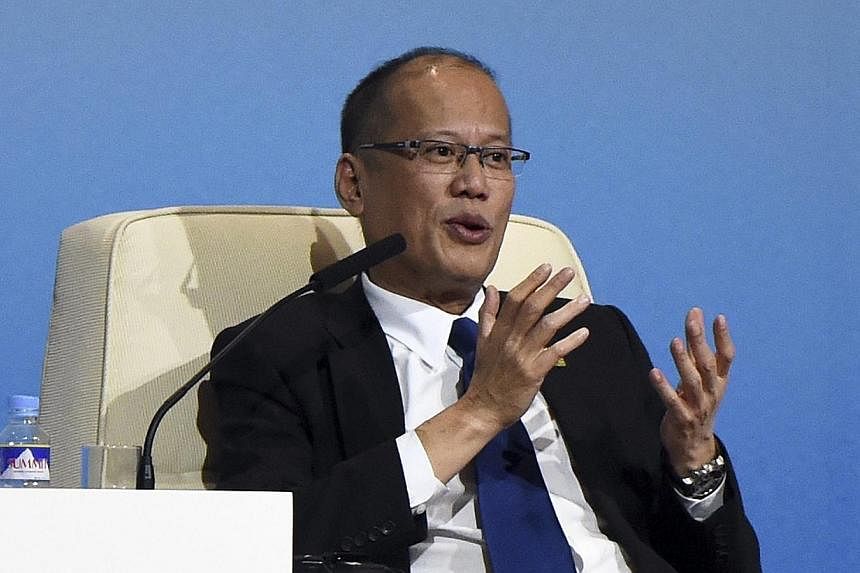 The reporters had their credentials withdrawn after they shouted questions at Mr Benigno Aquino during an Apec summit in Indonesia last year, and are currently unable to enter the Philippines for any reason. -- PHOTO: REUTERS