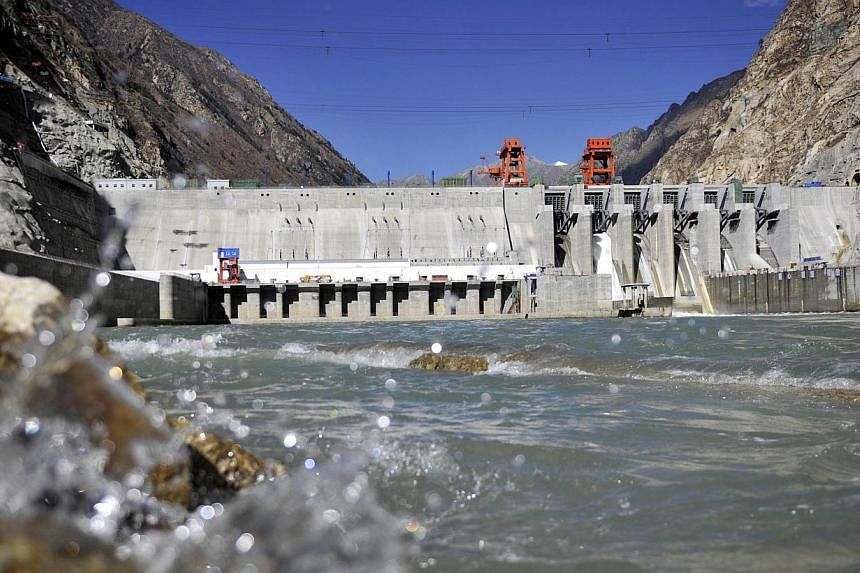 This picture taken on Nov 23, 2014 shows the Zangmu Hydropower Station in Gyaca county in Lhoka, or Shannan prefecture, southwest China's Tibet region. -- PHOTO: AFP