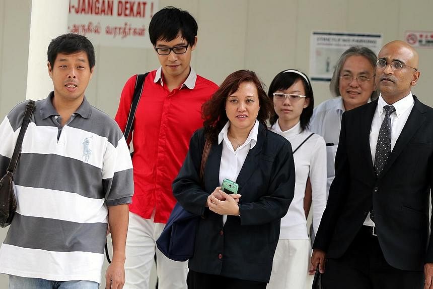 (From left) Mr&nbsp;Goh Aik Huat, Mr Roy Ngerng, Ms Low Wai Choo, Ms Han Hui Hui, Mr Koh Yew Beng and their lawyer Mr Ravi, arriving at the State Courts on Monday, Nov 24, 2014. The pre-trial conference for the case involving six people charged with 