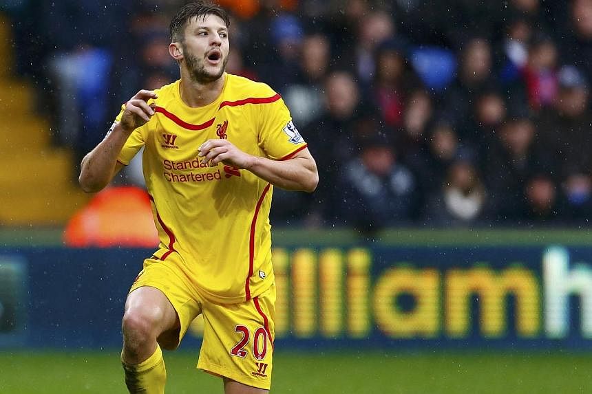 Liverpool's Adam Lallana reacts to a missed opportunity during their English Premier League football match against Crystal Palace at Selhurst Park in London on Nov 23, 2014. -- PHOTO: REUTERS