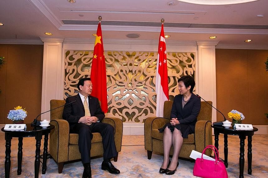 Minister in the Prime Minister's Office Grace Fu met Zhejiang Party Secretary Xia Baolong at the sidelines of 10th Singapore-Zhejiang Economic and Trade Council meeting today. -- PHOTO: INTERNATIONAL ENTERPRISE SINGAPORE