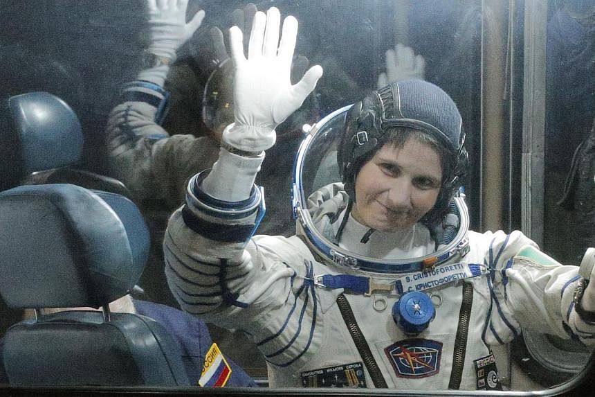 International Space Station crew Samantha Cristoforetti of Italy attends a sending-off ceremony before the launch of the Soyuz TMA-15 M spacecraft at the Baikonur cosmodrome in Kazakhstan on Nov 23, 2014. -- PHOTO: REUTERS&nbsp;