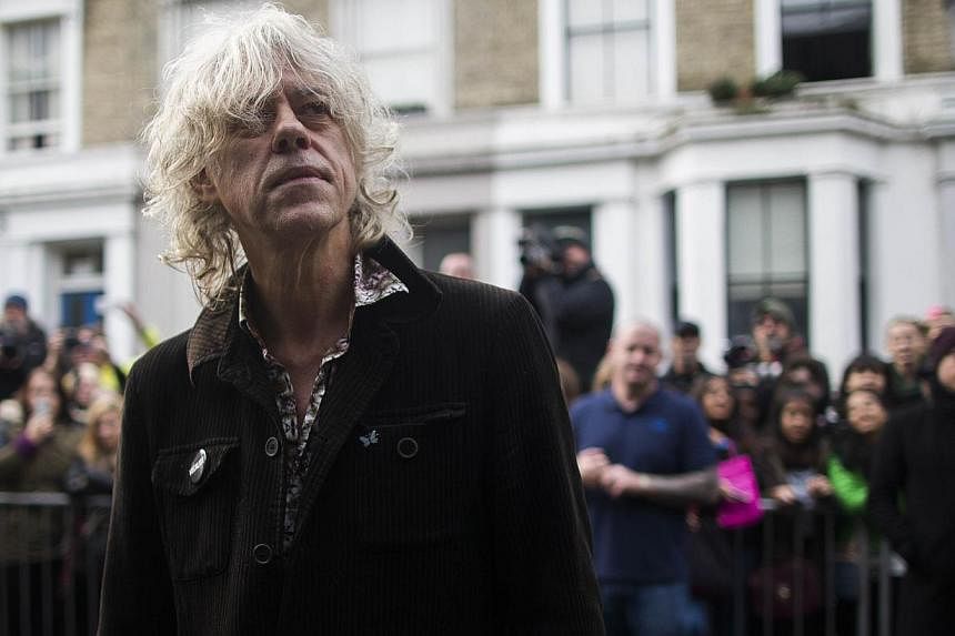 Irish musician Bob Geldof arrives at a west London studio to record the new Band Aid 30 single on November 15, 2014. Bob Geldof, One Direction, Bono and some 30 other stars recorded a 30th anniversary version of the Band Aid charity single Do They Kn