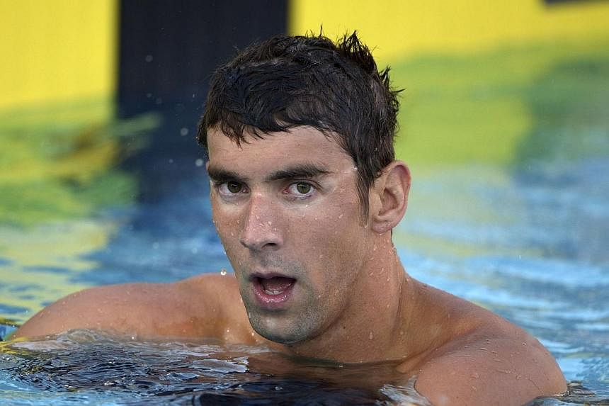 Michael Phelps reacts after placing seventh in the 100m freestyle in the 2014 USA National Championships in Irvine, California, in this file photo taken on Aug 6, 2014.&nbsp;Michael Phelps has been crowned Male Athlete of the Year for a fifth time at