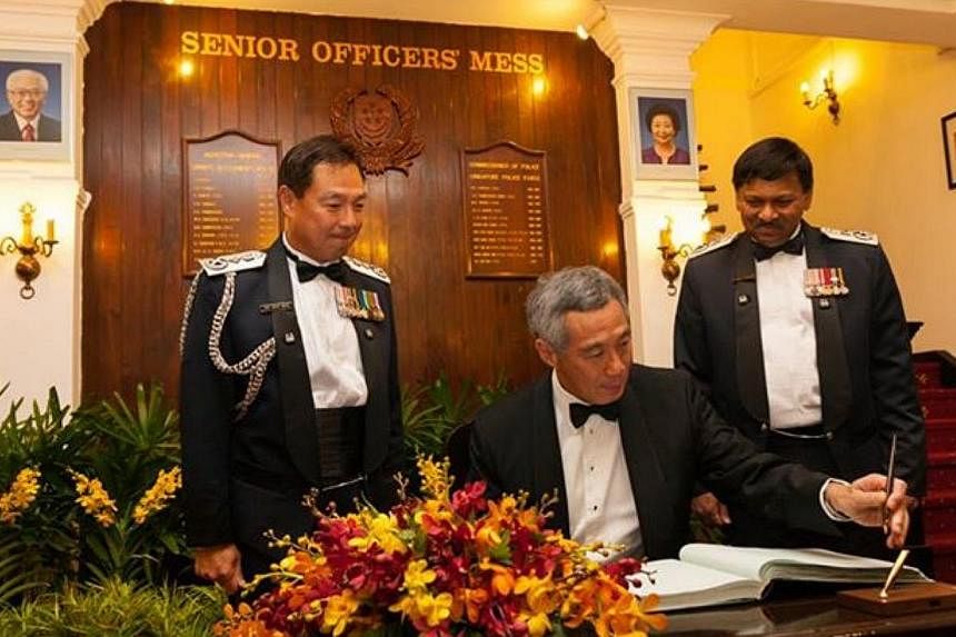 PM Lee at the Senior Police Officer's Mess on Mount Pleasant Road, where the Singapore Police Force held a dinner in his honour on Nov 25, 2014. -- PHOTO: SINGAPORE POLICE FORCE/FACEBOOK&nbsp;