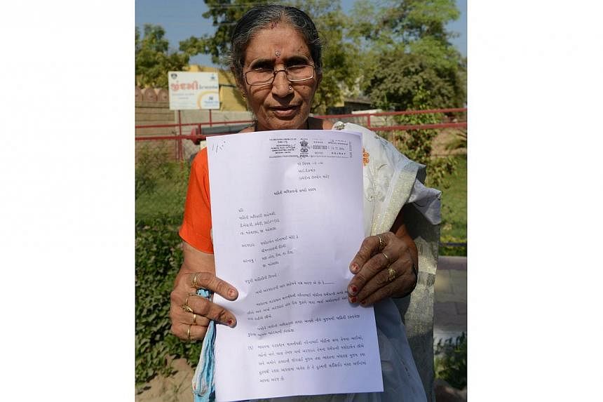 Ms Jashodaben Modi, 62, who lives in the western state of Gujarat, said she had filed a petition to find out why she has been given security cover since Mr Modi was elected in May. -- PHOTO: AFP