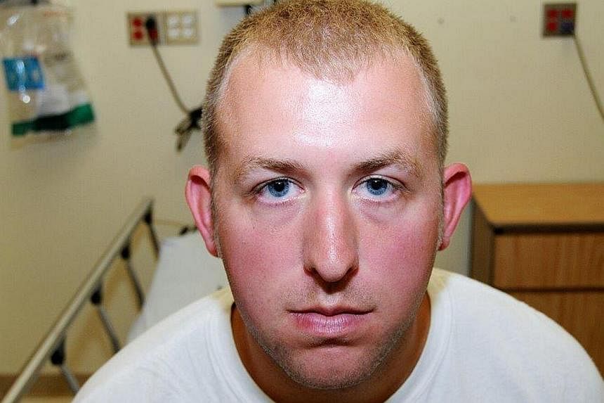 Police officer Darren Wilson's photo taken shortly after the Aug 9, 2014 shooting of Michael Brown. -- PHOTO: REUTERS