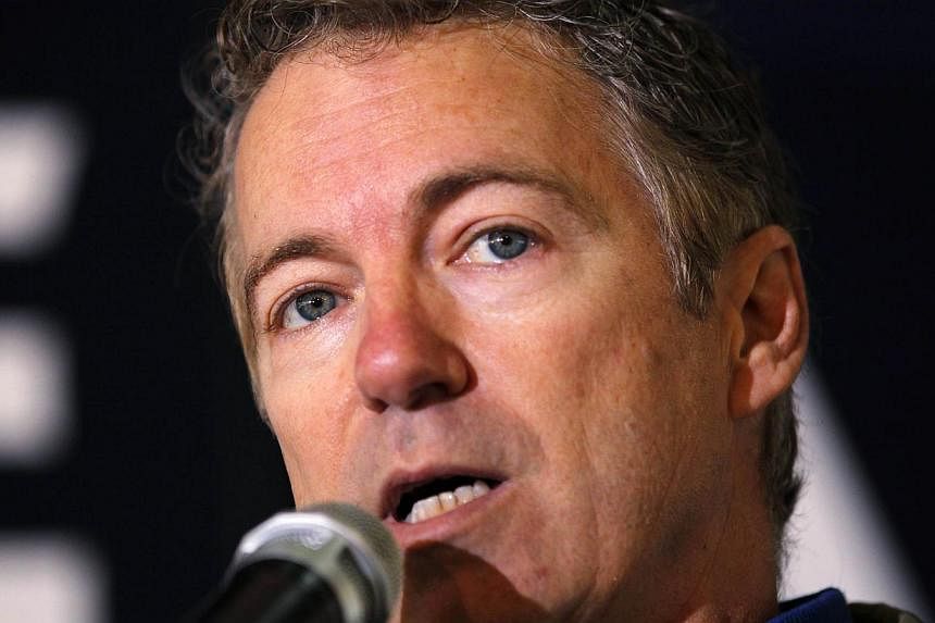 US Senator Rand Paul, a Republican from Kentucky considered a leading presidential contender, addresses a crowd at a campaign rally for a colleague in Lousville earlier this month. -- PHOTO: REUTERS&nbsp;