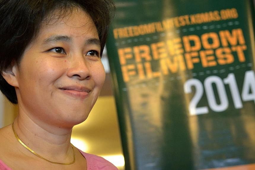 Director Tan Pin Pin at the screening of her film To Singapore With Love, at the Freedom Film Fest in Johor Baru on Sept 19, 2014. The show was given a “Not Allowed for All Ratings” classification by the MDA in Singapore. -- ST PHOTO: KUA CHEE SI