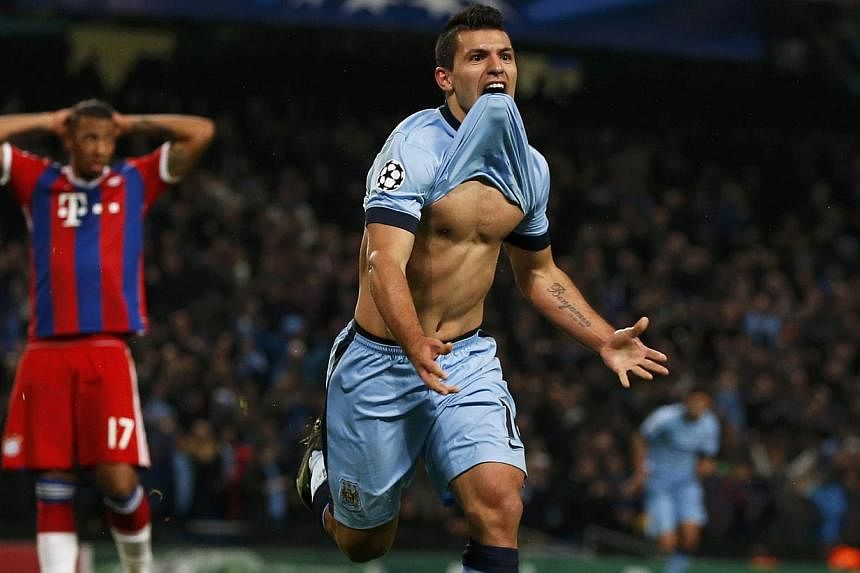 Manchester City's Sergio Aguero celebrates after he scored his third and winning goal against Bayern Munich during their Champions League Group E match in Manchester on Nov 25, 2014. -- PHOTO: REUTERS