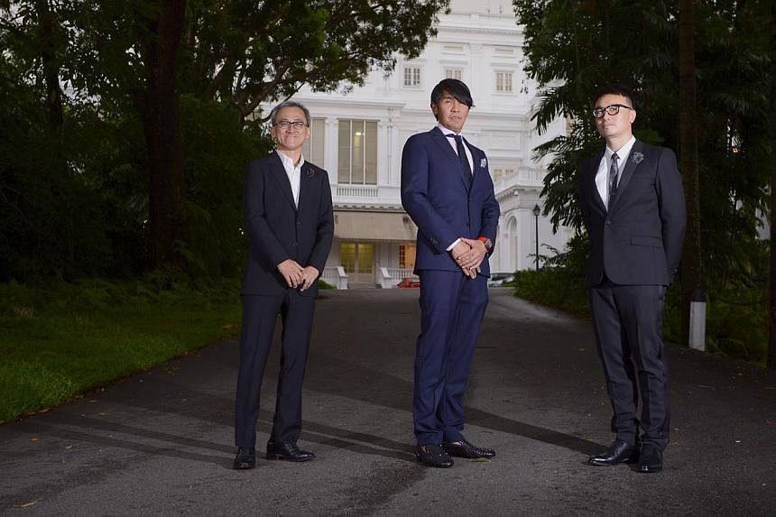 Winners of Designer of the Year at the President's Design Award 2014: (from left) Forum Architects director Tan Kok Hiang, Studio Peter Tay design director Peter Tay and Mr Larry Peh, founder and creative director of &Larry, at the Istana yesterday.