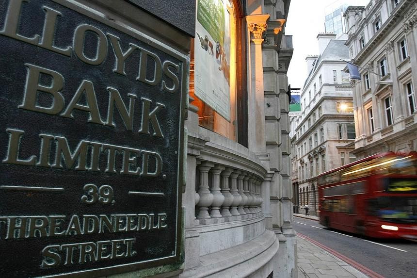 The biggest sum set aside by a bank for PPI compensation is the £11.3 billion at Lloyds Banking Group. -- PHOTO: REUTERS