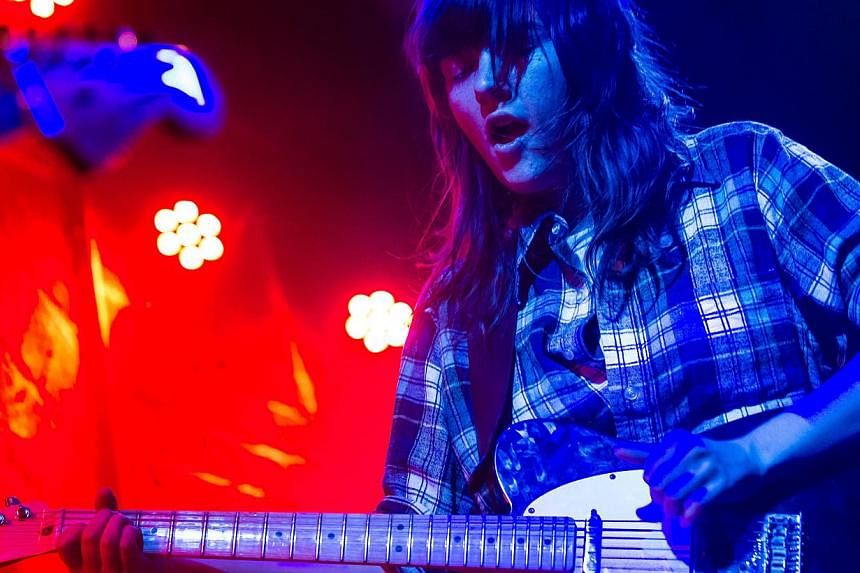 Australian singer and guitarist Courtney Barnett performs in concert at the Chelsea club in Vienna on Nov 23, 2014. -- PHOTO: AFP