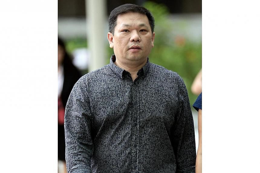 Tan Tee Wee,&nbsp;who wed his long-time girlfriend overseas when he was still married, was sentenced to two months in jail for bigamy on Wednesday. -- ST PHOTO:&nbsp;WONG KWAI CHOW