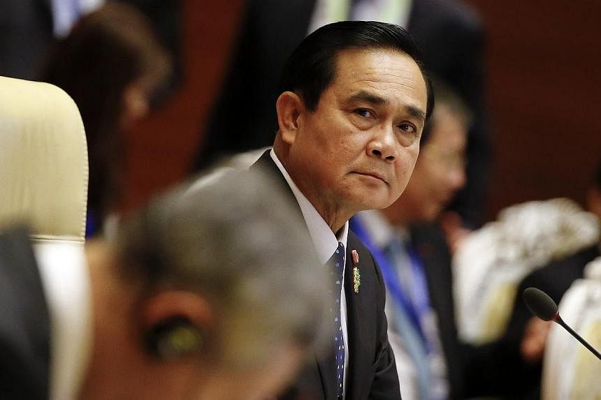 Thailand's Prime Minister Prayuth Chan-ocha attends the plenary session of the 25th ASEAN summit at Myanmar International Convention Centre in Naypyitaw on Nov 12, 2014. -- PHOTO: REUTERS