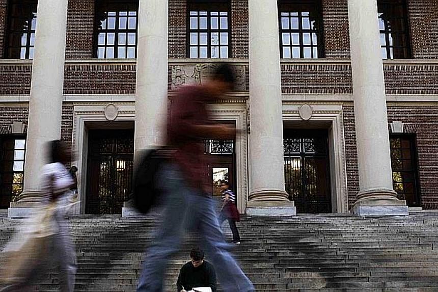 Students&nbsp;at the steps of Widener Library at Harvard University in Cambridge, Massachusetts.&nbsp;--PHOTO: REUTERS