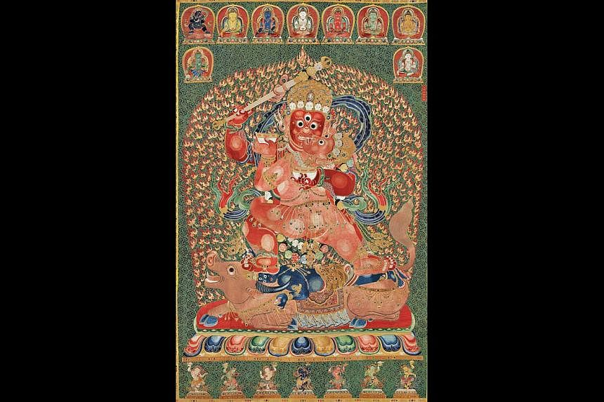 The 600-year-old Tibetan silk tapestry that&nbsp;set a world record for Chinese art after it was sold to a Shanghai tycoon for US$45 million (S$56 million) at auction in Hong Kong.&nbsp;-- PHOTO: AFP/CHRISTIES