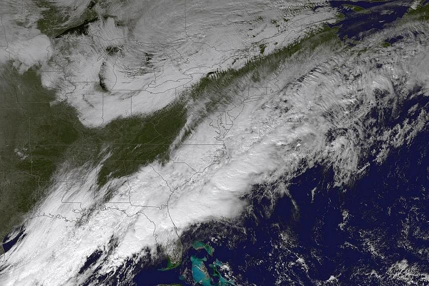 A National Oceanic and Atmospheric Administration image from Nov 25, 2014 shows a weather pattern set to impact the US East Coast.&nbsp;Hundreds of flights were cancelled or delayed on Wednesday in the US north-east as a winter storm delivered freezi