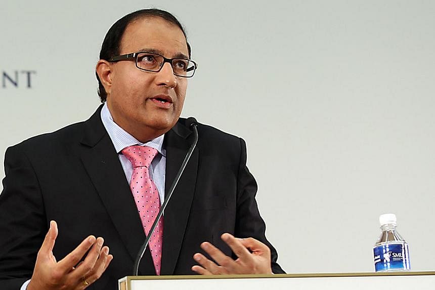 Second Minister for Trade and Industry S. Iswaran speaking at the Singapore Management University on May 21, 2014. -- PHOTO: SINGAPORE MANAGEMENT UNIVERSITY