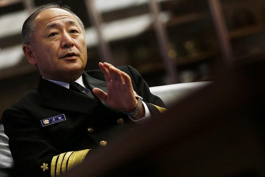 Admiral Katsutoshi Kawano, chief of the Japanese Self-Defense Forces' Joint Staff, speaks during an interview at the Japanese defense ministry in Tokyo on Nov 28, 2014.&nbsp;Japan's highest-ranking military officer on Friday urged an early start to a