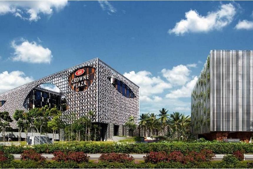 Artist's impression of Crowne Plaza Changi Airport hotel and a 10-storey hotel near Changi Airport Terminal 3.&nbsp;OUE Hospitality Trust has agreed to acquire Crowne Plaza Changi Airport and the Crowne Plaza Changi Airport Extension for nearly half 