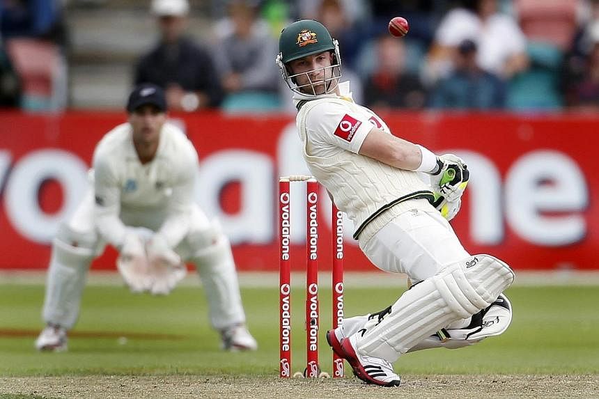 Australia's Phil Hughes avoids a high ball during the second cricket test match against New Zealand at Bellerive Oval in Hobart on Dec 11, 2011. Hughes, fatally struck by a ball on Tuesday, is our latest reminder of the perils confronting athletes. -