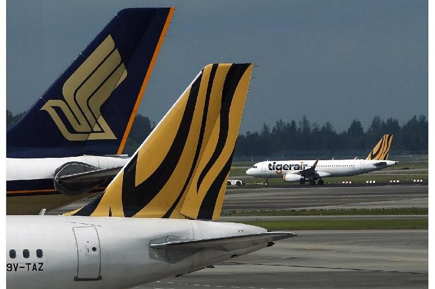 The Competition Commission of Singapore (CCS) has cleared the proposed acquisition of Tiger Airways Holdings by Singapore Airlines (SIA). -- PHOTO: REUTERS