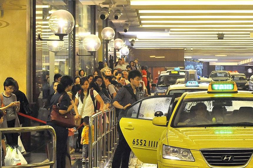 There are 1,400 more cabs available now during the peak hour grind than there were two years ago. But many commuters have yet to feel the difference.