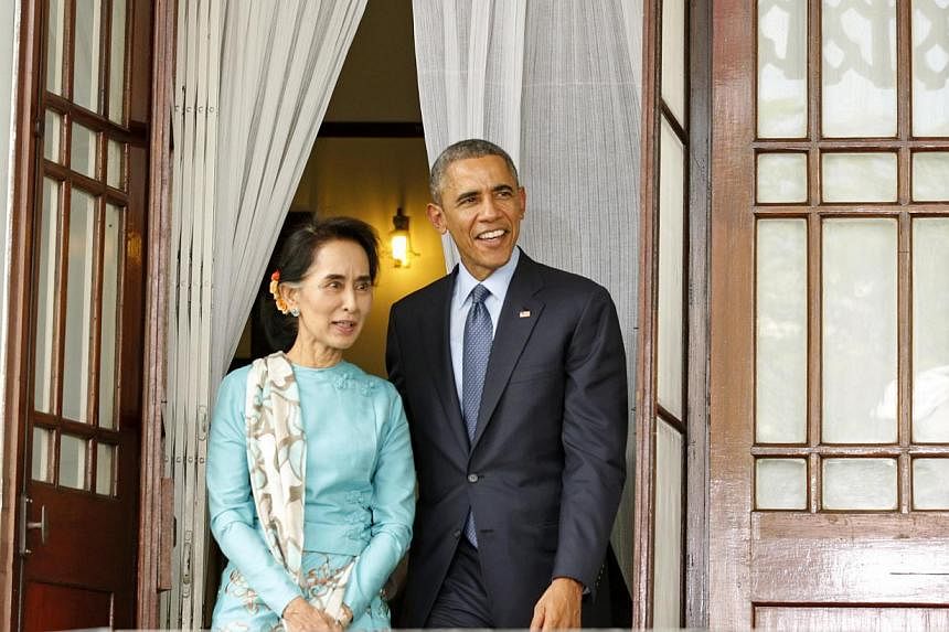 US President Barack Obama and opposition politician Aung San Suu Kyi step outside to hold a news conference after their meeting at her residence in Yangon on Nov 14, 2014.&nbsp;Myanmar's military turned down a dinner invitation from opposition leader