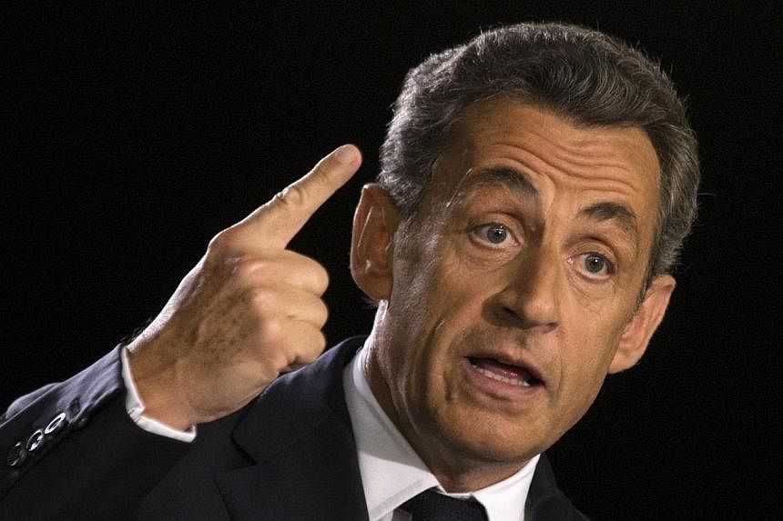 French former President Nicolas Sarkozy delivers a speech at a campaign rally for the leadership of the UMP political party in Paris on Nov 7, 2014.&nbsp;France's former president Nicolas Sarkozy was on Saturday tipped to win the leadership of his ri