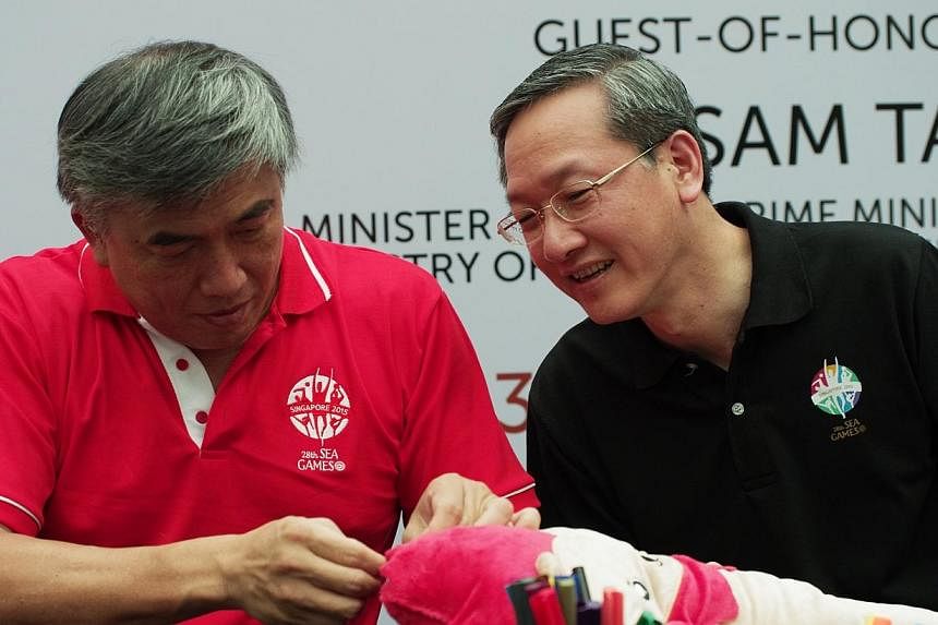 Mr Lim Teck Yin and MOS Sam Tan at Make-a-NILA event. -- PHOTO: SPORT SINGAPORE