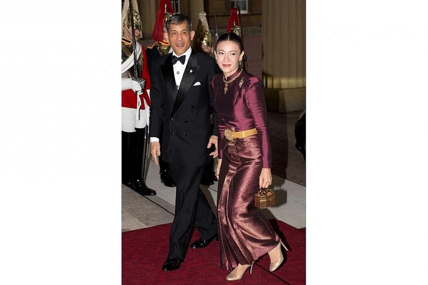 Crown Prince Maha Vajiralongkorn of Thailand and his wife, Princess Srirasmi, attend a dinner for foreign sovereigns hosted by the Prince of Wales and the Duchess of Cornwall at Buckingham Palace on May 18 2012. -- PHOTO: SNAPPER MEDIA&nbsp;