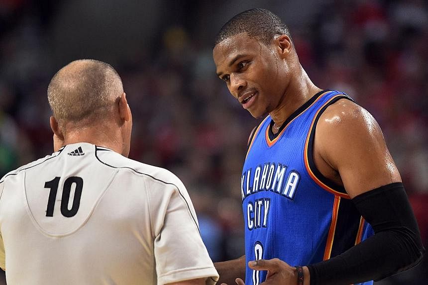 The struggling Oklahoma City Thunder gained a massive boost with their All-Star point guard Russell Westbrook (above, in October 2014) set to make his return from injury against the New York Knicks on Friday. -- PHOTO: AFP
