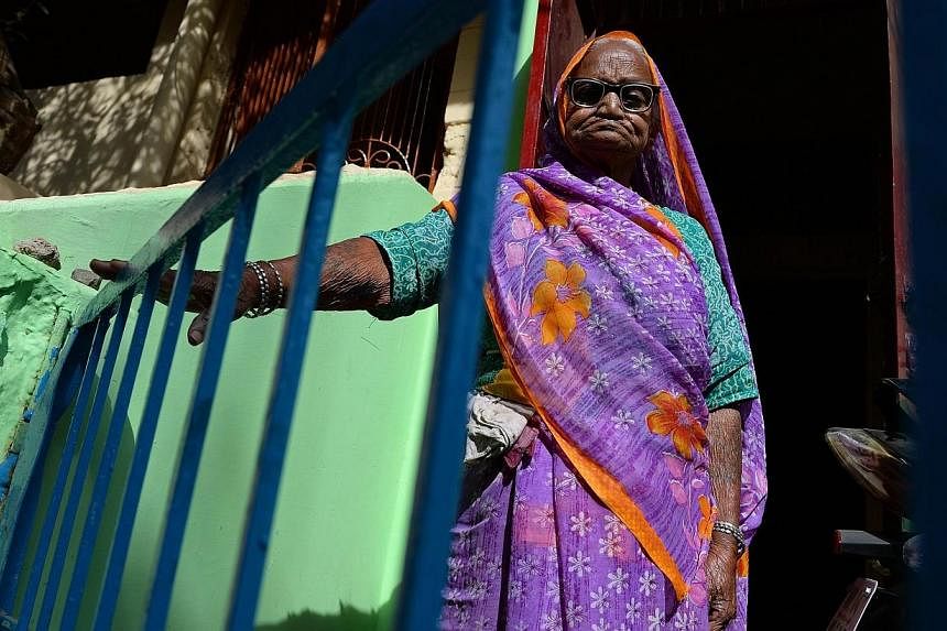 Bhopal gas disaster survivor Rampyari Bai, 90, now nearly deaf and riddled with cancer and ulcers, insists she will never give up fighting for justice for victims of the world's worst industrial disaster. -- PHOTO: AFP