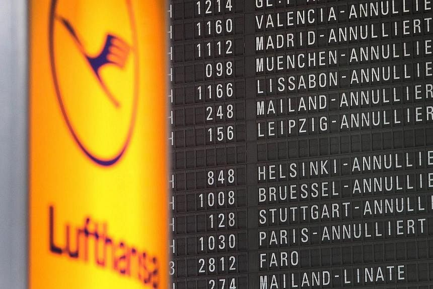 A display showing cancelled flights due to a strike of pilots of German airline Lufthansa is pictured at the airport in Frankfurt am Main, western Germany, on Oct 21, 2014.&nbsp;A leading German pilots' union has called a fresh walkout at Lufthansa s