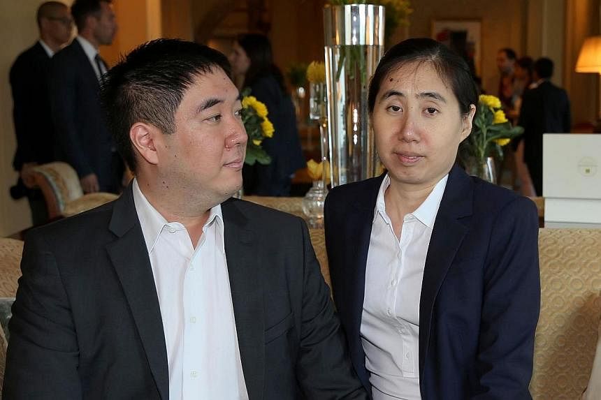 Matthew and Grace Huang, a US couple who were sentenced to three years in jail in Qatar in April 2014 for allegedly causing the death of their adopted daughter Gloria, were acquitted on Sunday by a Qatari court. -- PHOTO: AFP