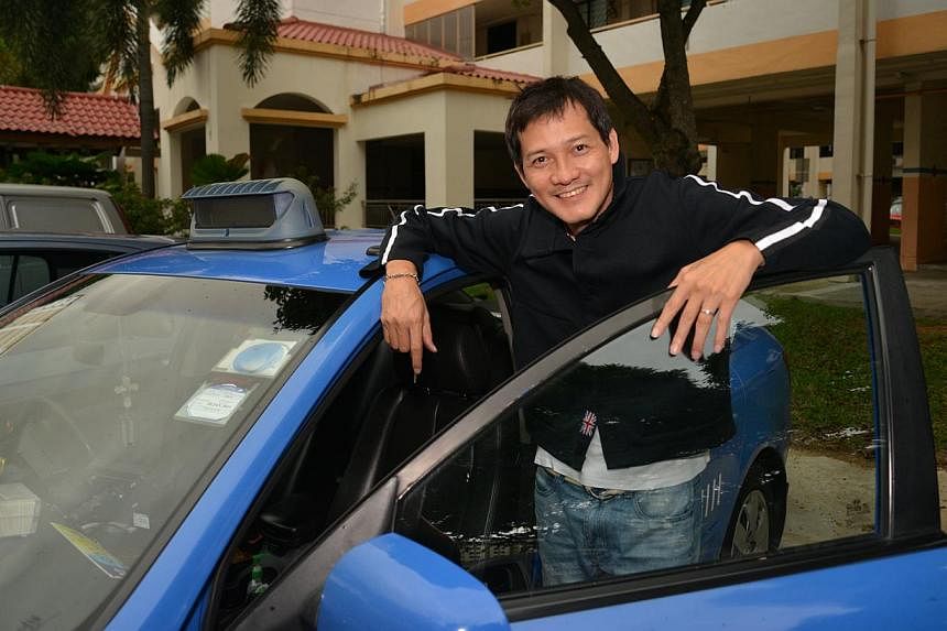 Earnings from his job as a taxi driver are helping Peter Yu to service his gambling debts chalked up after his divorce from TV host Quan Yifeng. --&nbsp;ST PHOTO: BENSON ANG