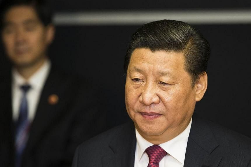 "We should firmly uphold China's territorial sovereignty, maritime rights and interests and national unity," Mr Xi told a Communist Party meeting on foreign affairs held on Friday and Saturday. -- PHOTO: AFP