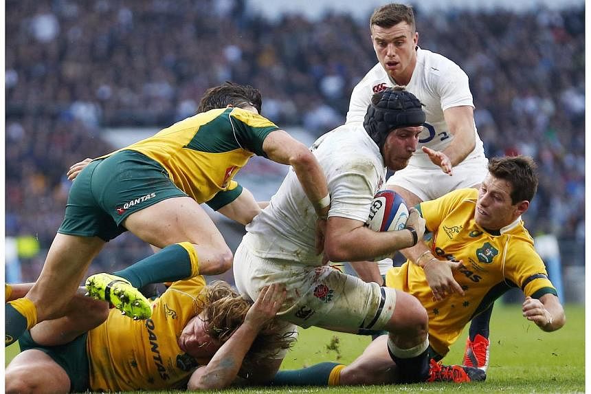 Ben Morgan of England scores a try against Australia during their international rugby test match at Twickenham Stadium in London, Nov 29, 2014.-- PHOTO: REUTERS