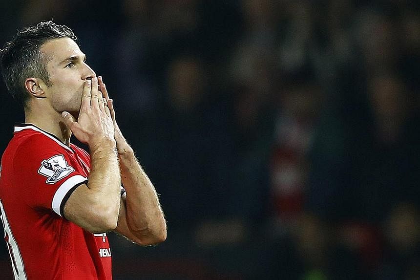 Manchester United's Robin van Persie celebrates his goal against Hull City during their English Premier League soccer match at Old Trafford in Manchester, northern England, Nov 29, 2014. -- PHOTO: REUTERS