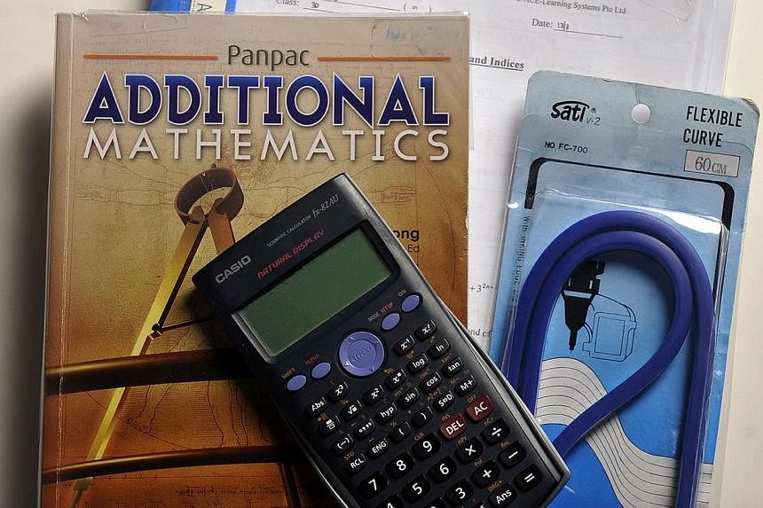 Textbooks used in Singapore schools have been held up as examples of teaching excellence by a British minister, who is pushing for Britain to adopt high-quality textbooks to raise the country's academic standards. -- PHOTO: ST FILE&nbsp;