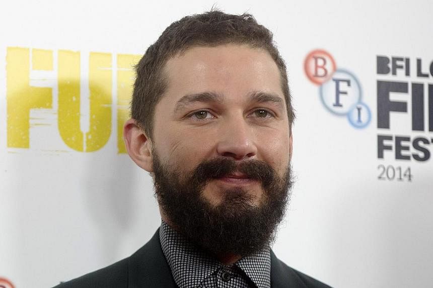 Actor Shia LaBeouf poses during a photocall for his film Fury in London on Oct 19, 2014. -- PHOTO: REUTERS