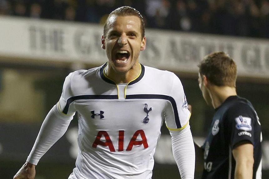 Tottenham Hotspur's Roberto Soldado celebrates after scoring his team's second goal during their English Premier League soccer match against Everton at White Hart Lane in London on Nov 30, 2014. -- PHOTO: REUTERS