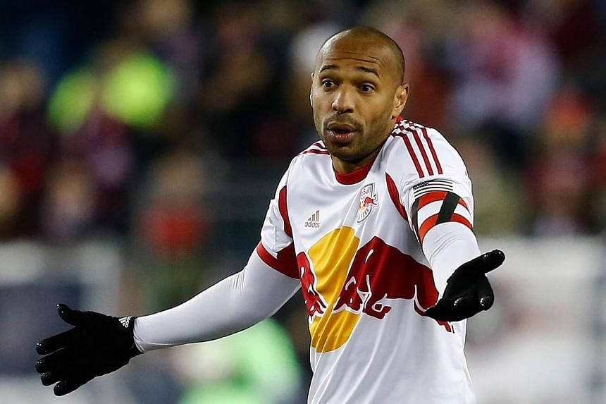 Thierry Henry #14 of New York Red Bulls reacts in the second half against the New England Revolution in the second half during Leg 2 of the MLS Eastern Conference game at Gillette Stadium on Nov 29, 2014 in Foxboro, Massachusetts.&nbsp;Thierry Henry 