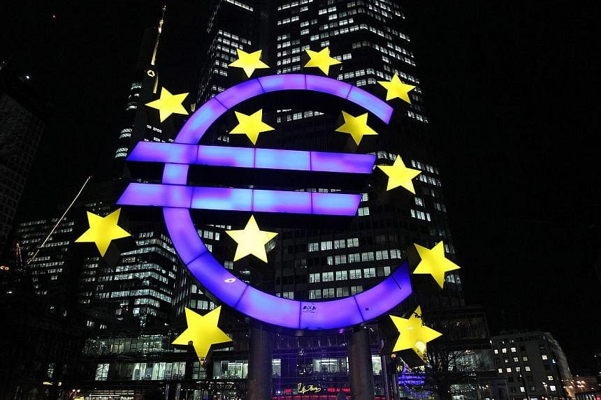 An illuminated euro sign in front of the European Central Bank (ECB) in Frankfurt, western Germany.&nbsp;-- PHOTO: AFP