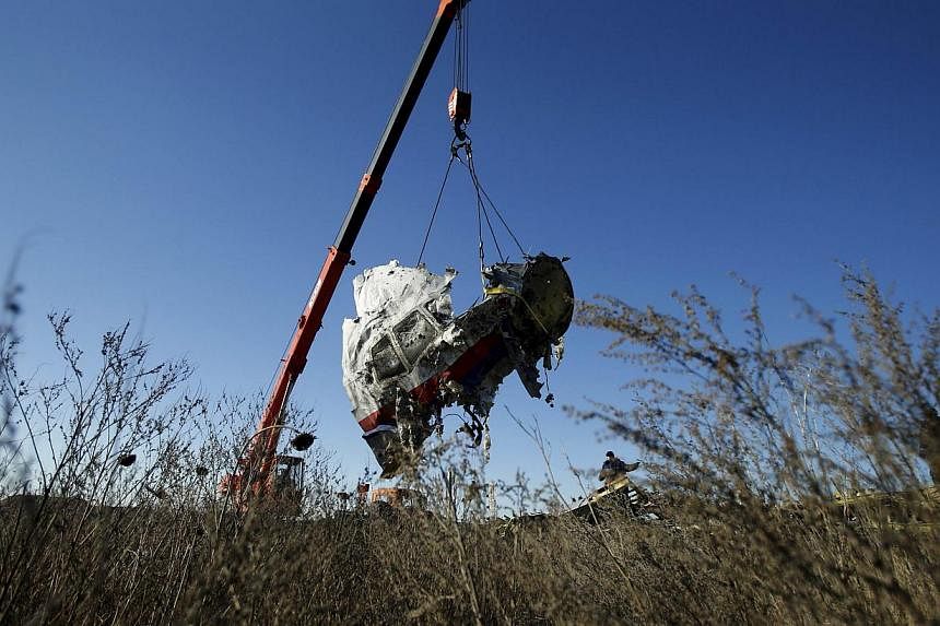 Wreckage of Malaysia Airlines flight MH17 recovered from its crash site in eastern Ukraine will be reassembled for an investigation at a military base in the Netherlands, Dutch authorities said on Monday. -- PHOTO: REUTERS