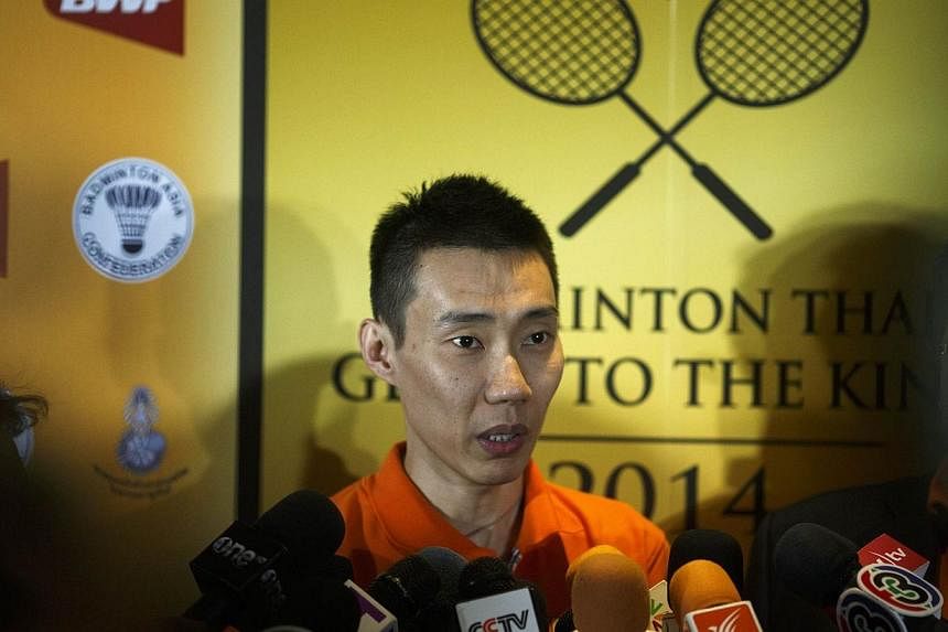 Malaysia's Lee Chong Wei speaks to media during a news conference in Bangkok on Nov 21, 2014. The embattled world No. 1 shuttler confirmed he will be suing former Malaysian national player Razif Sidek&nbsp;and a Malay daily newspaper over allegations
