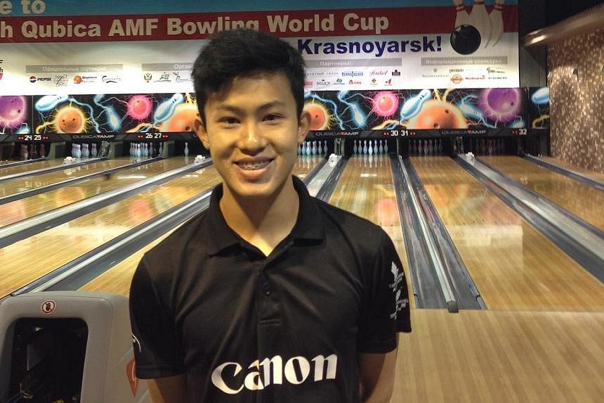 National bowler Joel Tan at the QubicaAMF Bowling World Cup in Krasnoyarsk in Russia in 2013.&nbsp;He was in top form as he notched four 300-pinfall games yesterday, two in qualifying, one in the Masters and another in the step ladder finals at the 1